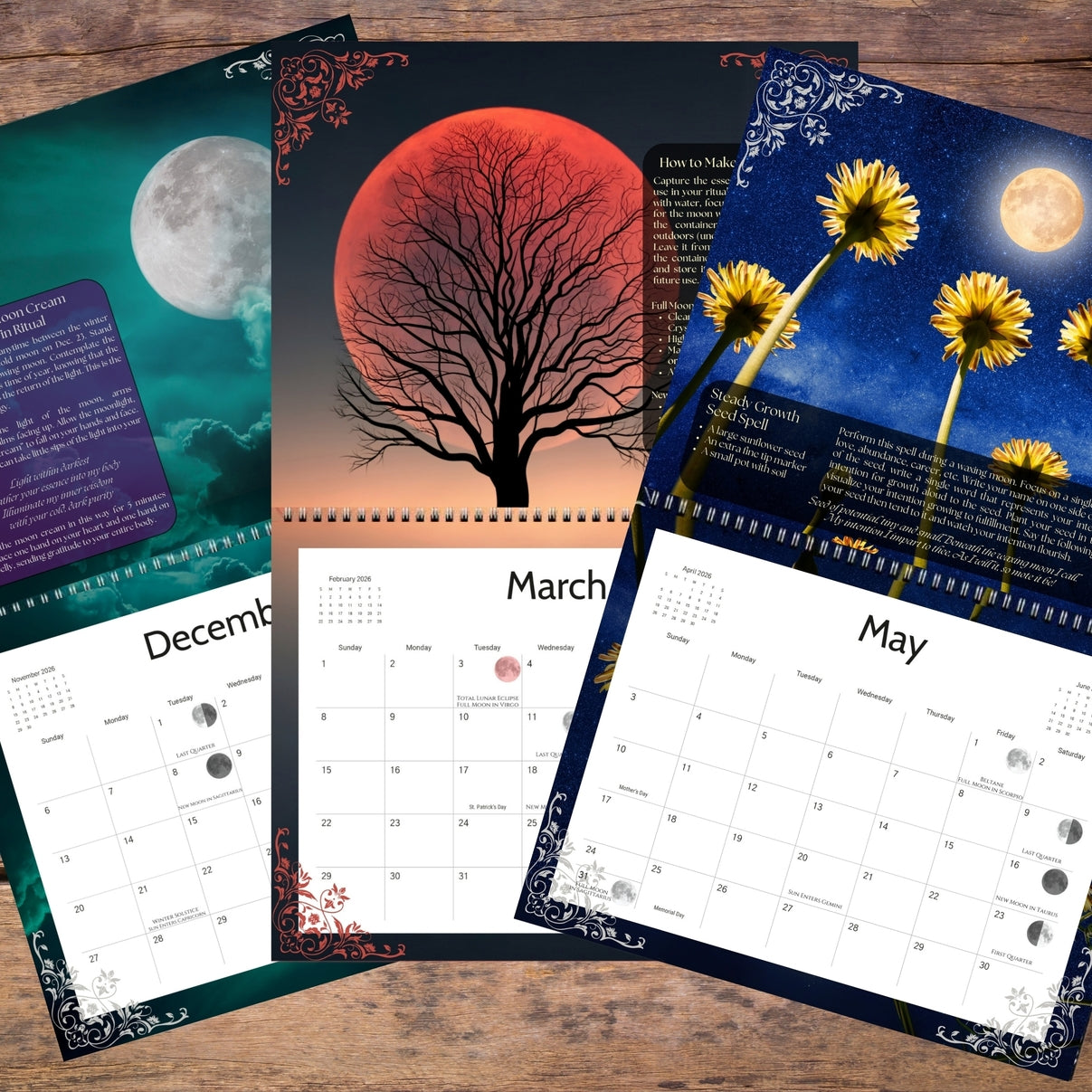 Collection of spiral-bound calendars with various designs on a wooden surface