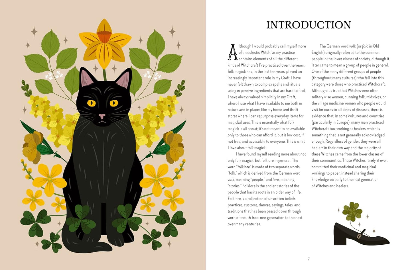 Book open to a page with a black cat illustration surrounded by flowers and leaves on the left, and text on the right.