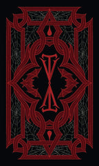 Decorative red symbol on a black background with spider web design