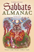 Front cover of the 'Sabbats Almanac 2027' by Llewellyn's. The cover features a whimsical, folk-art style illustration of a woman with long red hair and a wolf's head on her shoulder, set against a landscape with trees, a full moon, and candles.