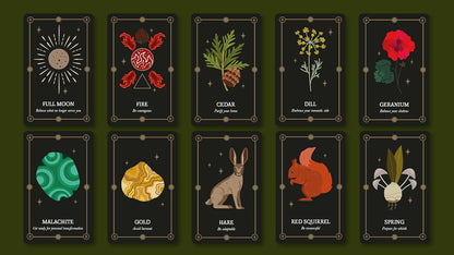 Set of tarot cards with various symbols and names on a dark background