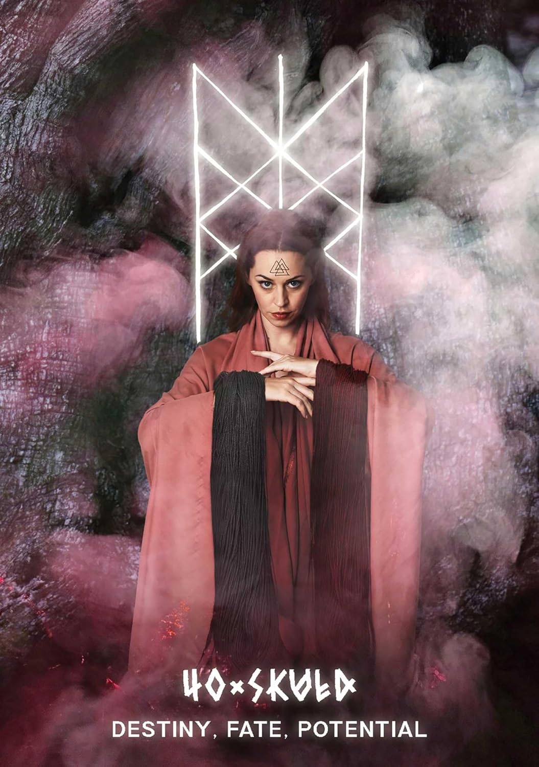 Woman in a red robe with a mystical symbol above her head, surrounded by smoke and light.