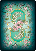 Decorative card with floral design and text on a teal background