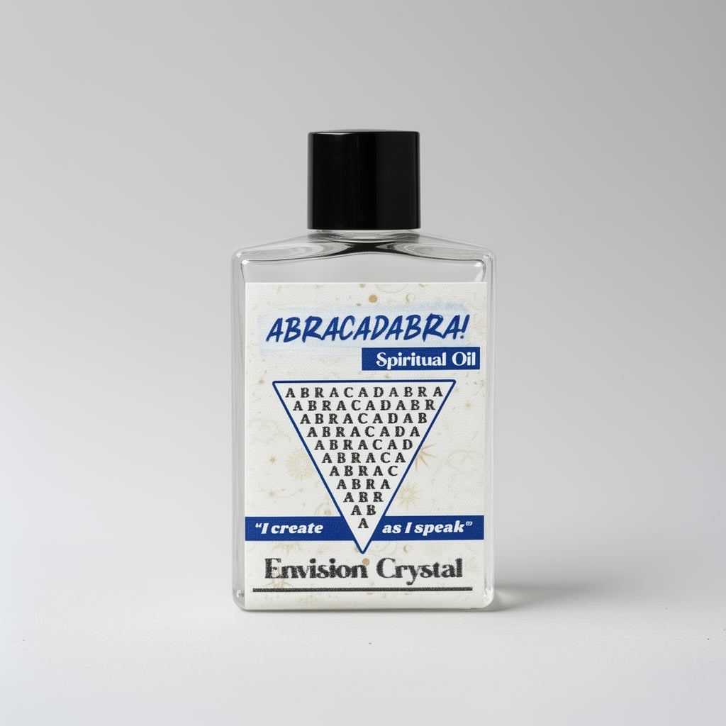 Bottle of 'Abracadabra!' spiritual oil with a black cap on a gray background