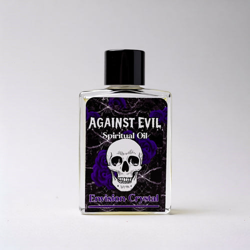 Bottle of 'Against Evil' spiritual oil with a skull design on a white background