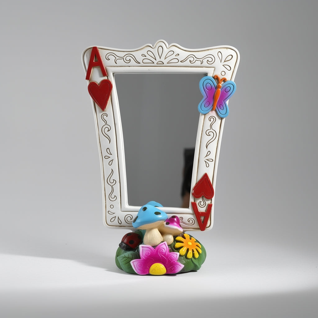 Decorative mirror with colorful frame and base featuring a mushroom, flower, and butterfly on a gray background.