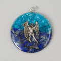 Pendant with angel design on a blue and turquoise stone background