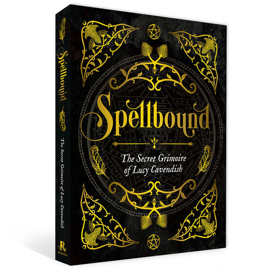 Book titled 'Spellbound' with gold text on a black background