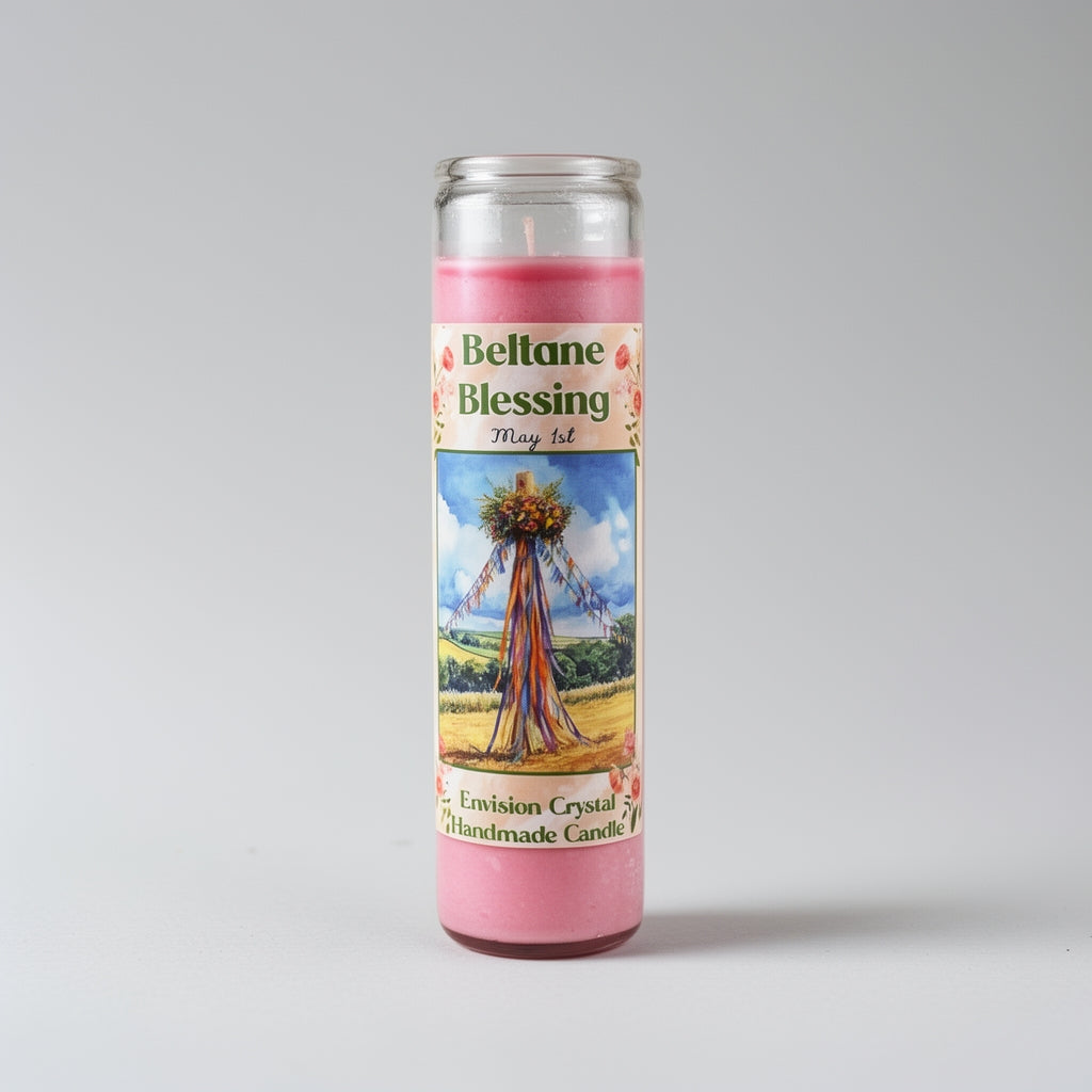 Pink candle with a label titled 'Beltane Blessing' on a gray background