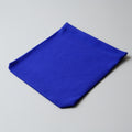 Blue cotton pouch on a gray background