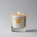Candle with a label reading 'Confidence' on a gray background