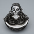 Decorative piece of a woman with a skull face design on a gray background