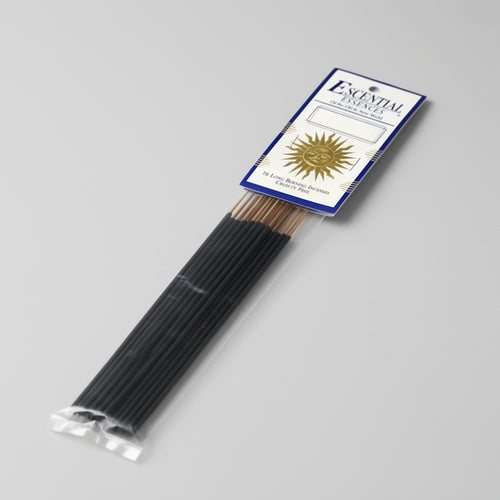 Pack of incense sticks with a blue label on a gray background