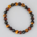 Beaded bracelet with multicolored beads on a light gray background