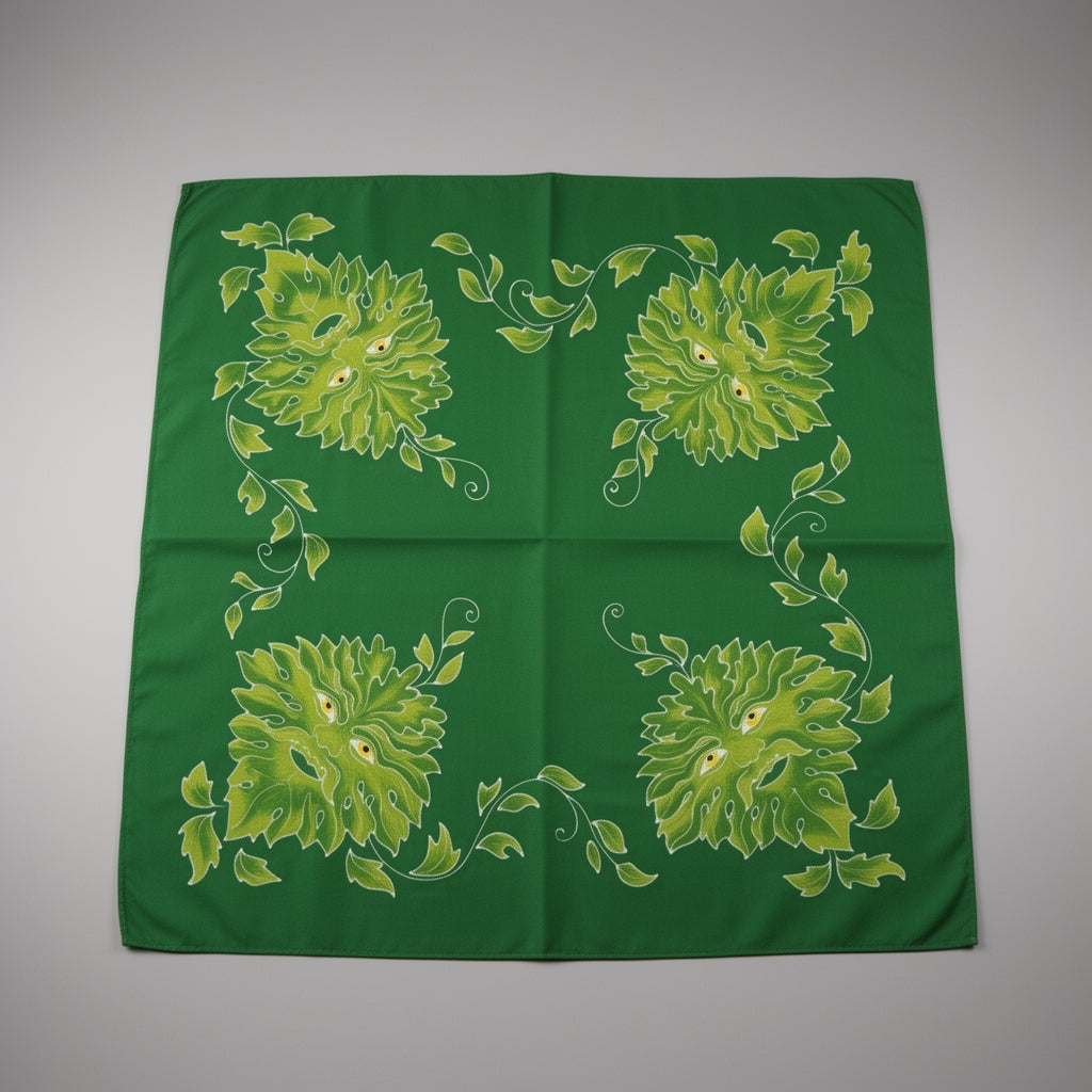 Green fabric with floral patterns on a gray background