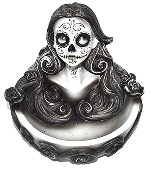 Decorative bust with skull design on a white background