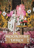 Cover of 'Moonjube Tarot' with a woman in a garden setting, surrounded by flowers and a mushroom table.