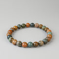 Multicolored beaded bracelet on a white background