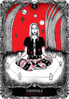 Tarot card with a person in a meditative pose against a red background with celestial elements.