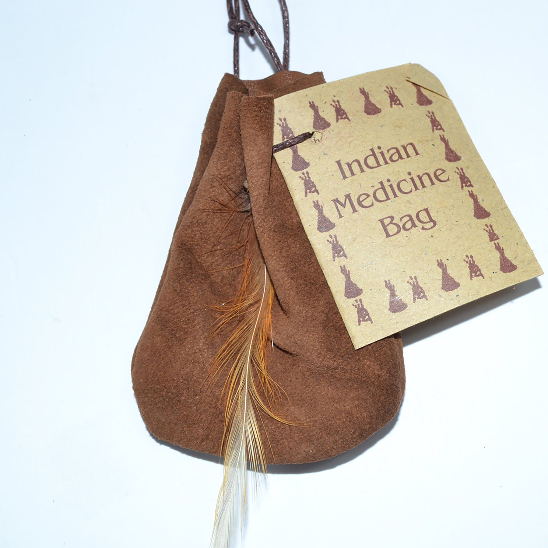 Brown 'Indian Medicine Bag' with a feather and tag on a white background