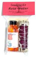 Smudging kit with rose water bottle and sticks in clear packaging on a white background