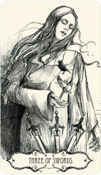 Tarot card illustration of 'Three of Swords' with a woman holding swords.