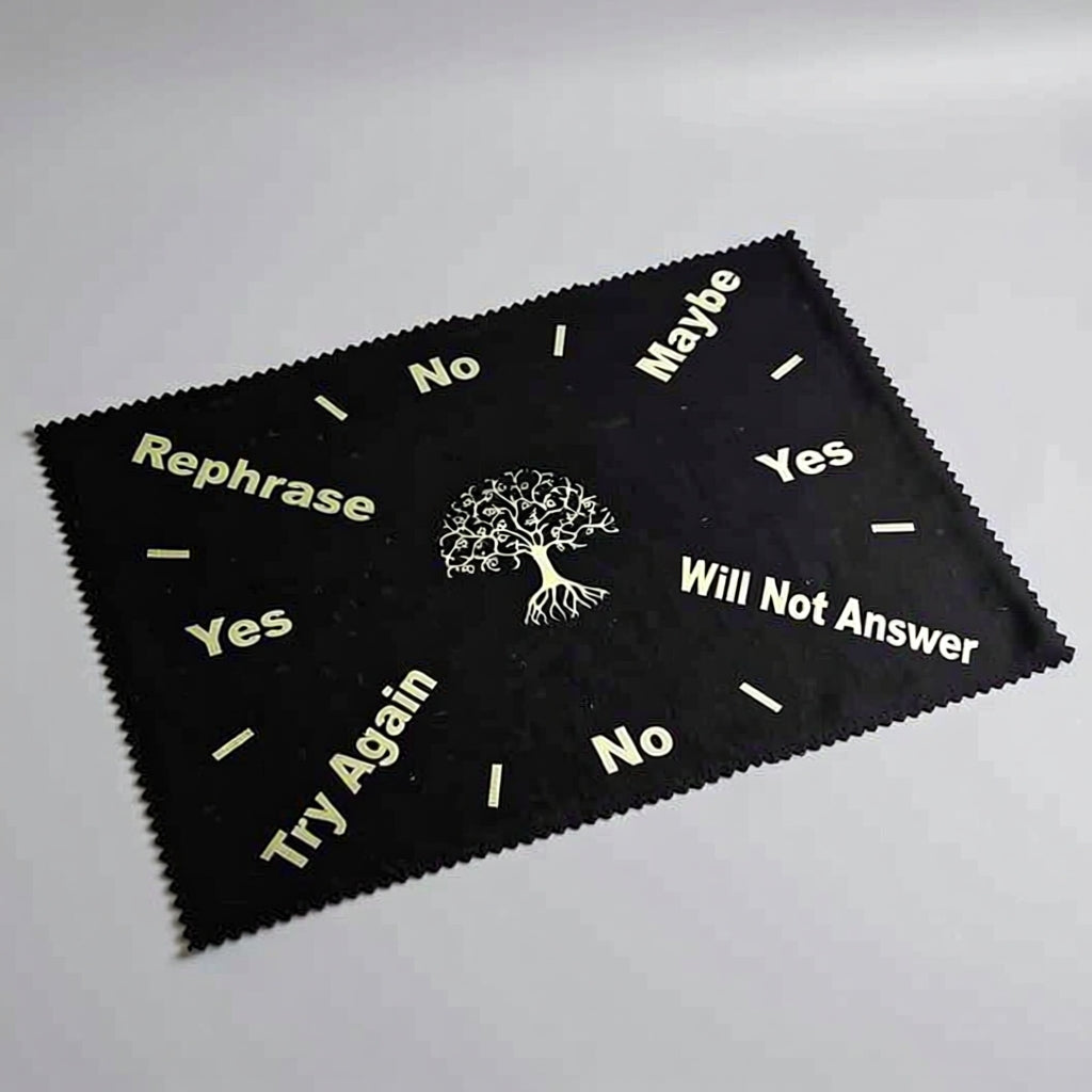 Black cloth with white text and a tree design on a gray background