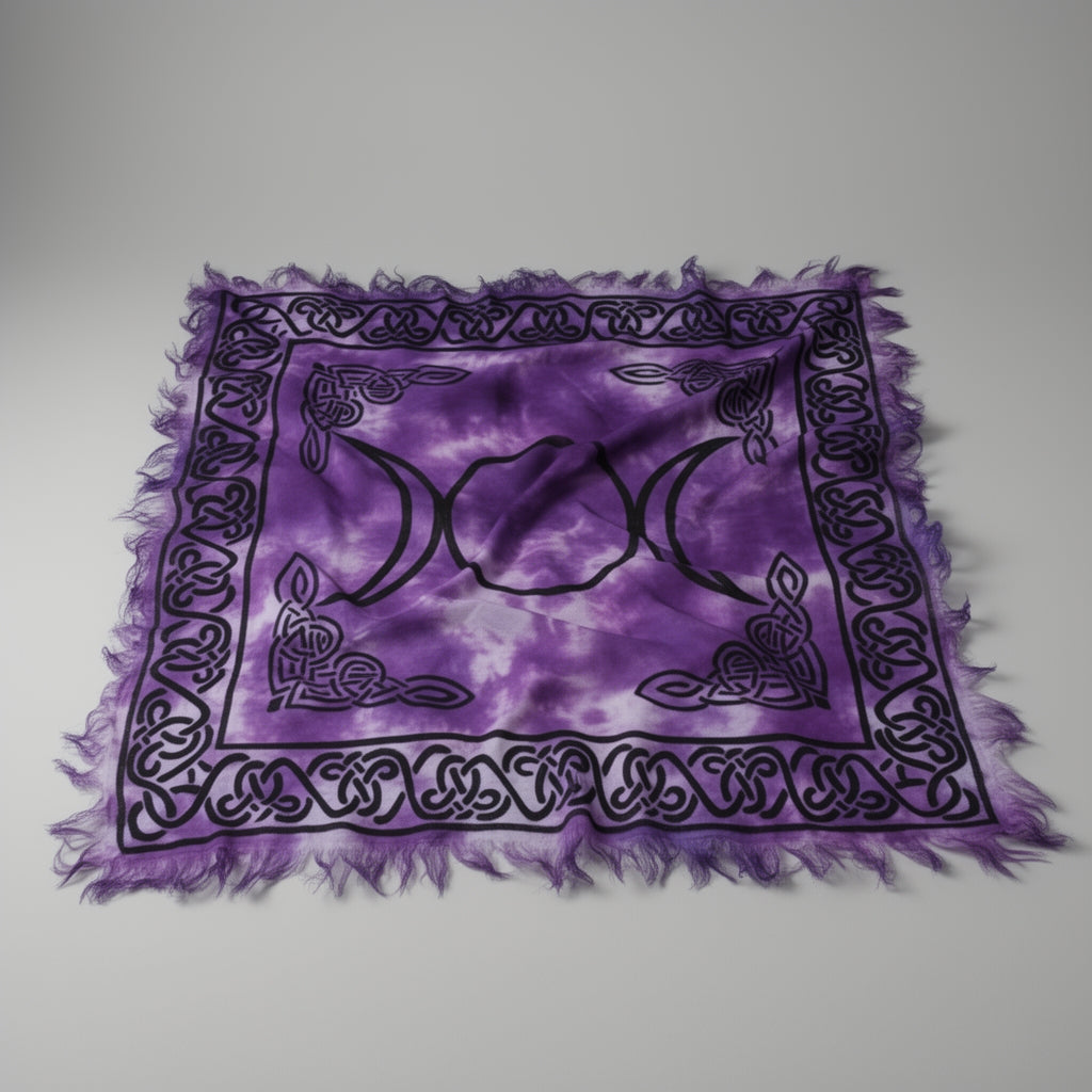 Purple bandana with black designs on a gray background