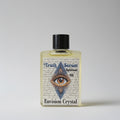 Bottle of 'Truth Serum Spiritual Oil' by Envision Crystal on a gray background